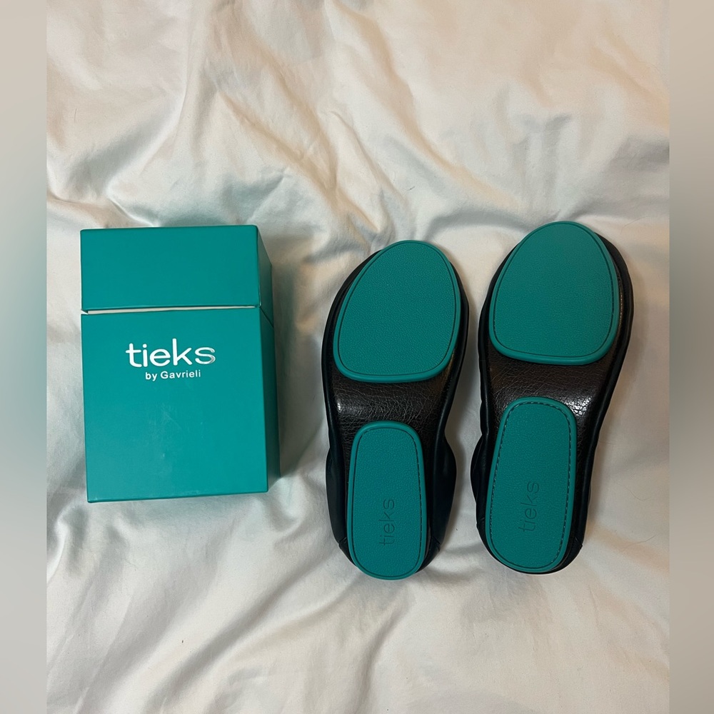 New black Tieks flats